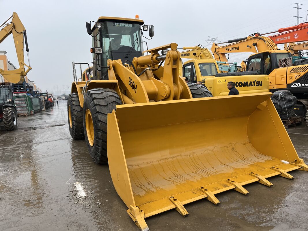 Cargador de ruedas usado CAT 966H con alta fuerza de ruptura y un tren motriz robusto que ofrece rendimiento en ambientes industriales adversos