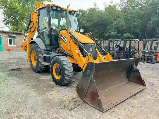 Excavadora de retroexcavadora JCB 3CX usada con cubo dividido y brazo extendido